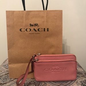 LIKE NEW COACH ROSE PINK WRISTLET